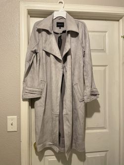 Nuevo  talla M gris claro, material suede 