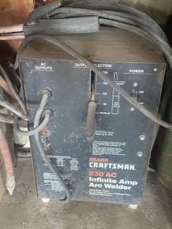 Welder and. Tanks with hoses