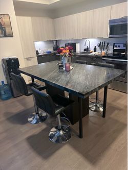 Large black/grey marble table