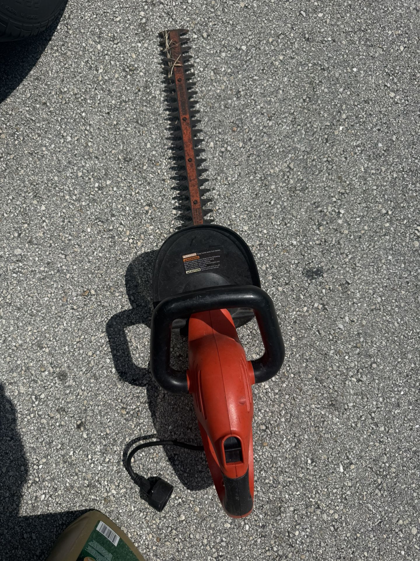 BLACK+DECKER 22-inch Corded Electric Hedge Trimmer (model BEHT350).