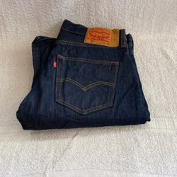 Two Pair Of New Levi 501. One Blue And One Black