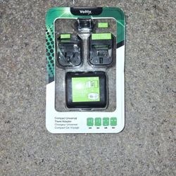 Compact universal travel adapter
