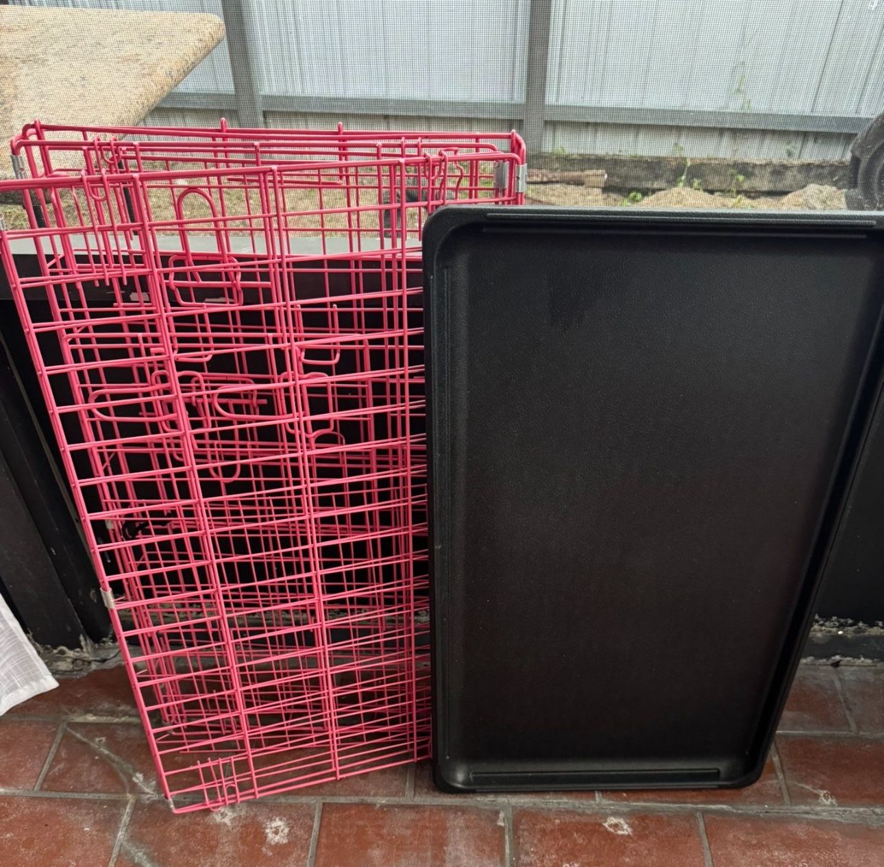 pink dog cage