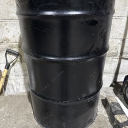 Barely Used Black Colored 55 Gallon Metal Drum 