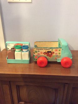 VINTAGE FISHER PRICE MILK WAGON TRUCK WITH CARRIER AND 6 BOTTLES 1966