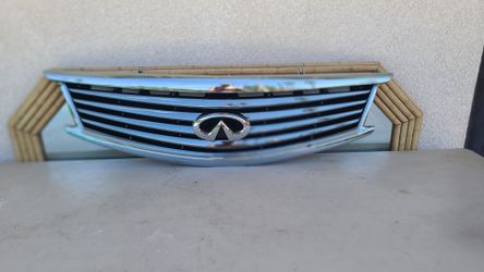 2010 - 2013 INFINITI G37  G37x SEDAN  GRILLE GENUINE OEM . G2