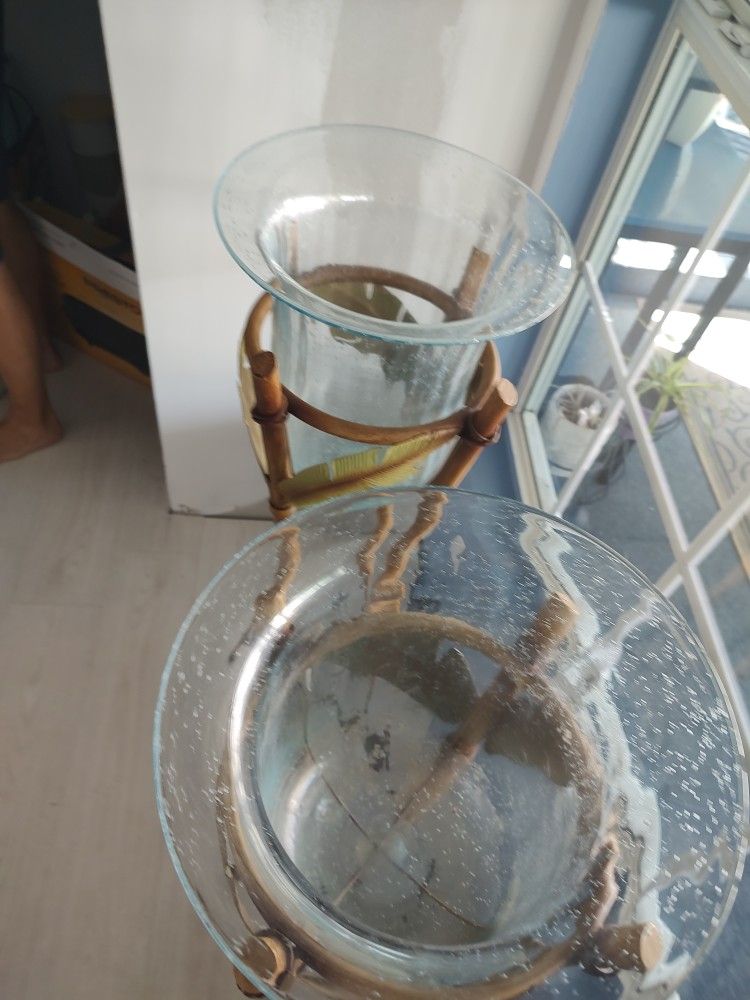 Beautiful metal and glass plant holders set of two good condition $75 OBO