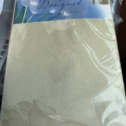 NIP Spring Bouquet brand Damask tablecloth designed for a 70-inch round table. 