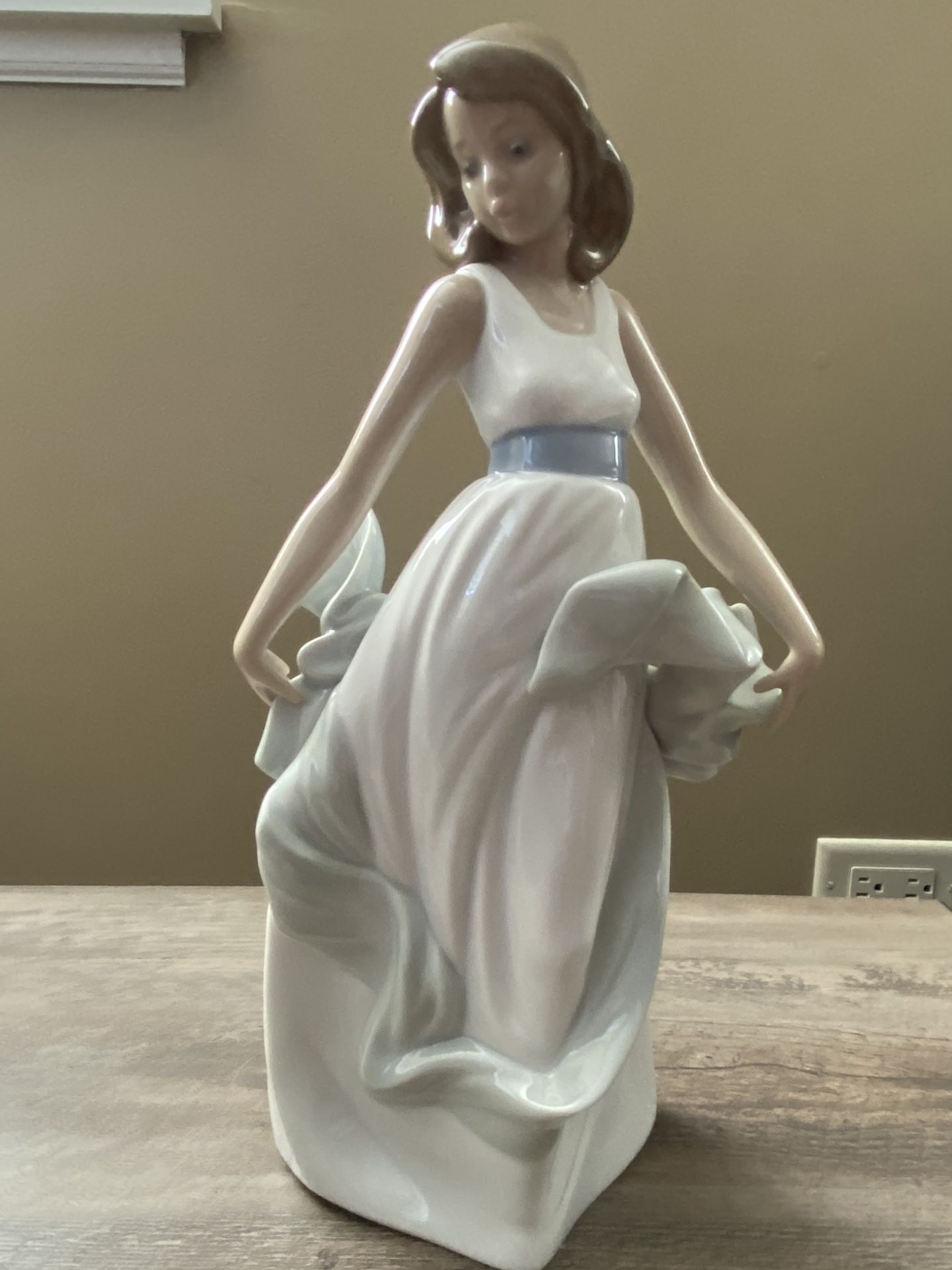 Nao By Lladro “ Walking On Air”  figurine