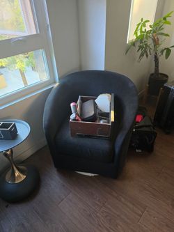 2 black swivel chairs