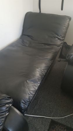 Black leather lounge chair