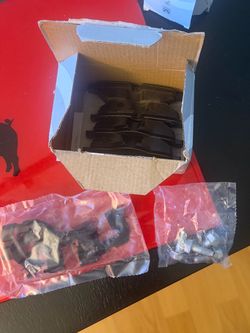 Brand new. Genuine OEM Rear brake pad repair kit