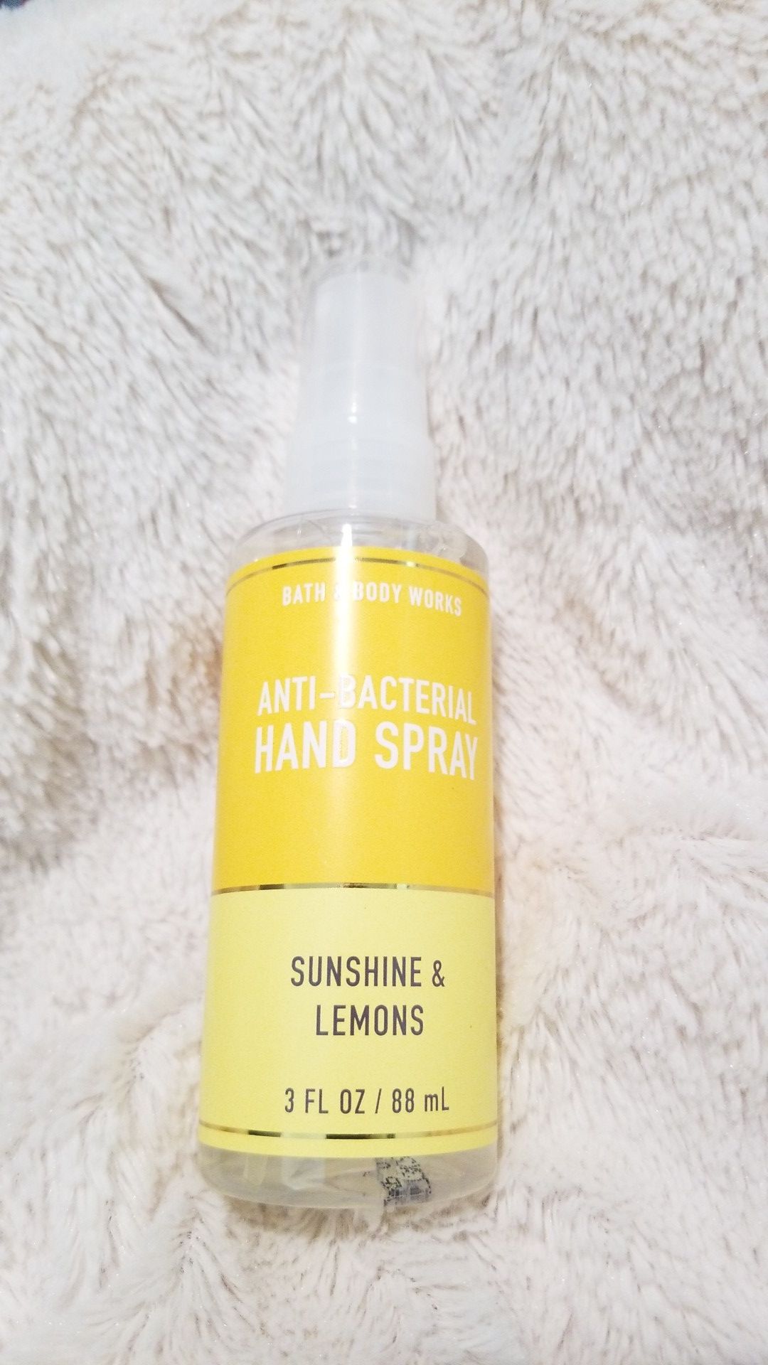 Hand spray sunshine lemons
