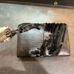 Christian Dior x Jason Martin clutch