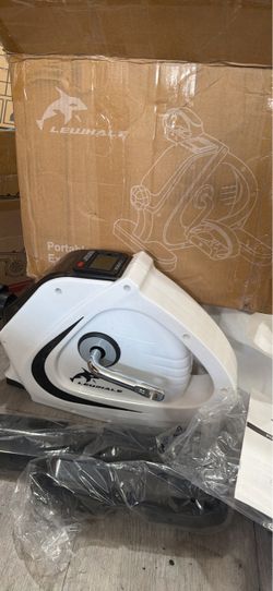 New LEWHALE portable exercise bike. This mini trainer has a digital display. Comes with manual and all parts still in plastic packaging.