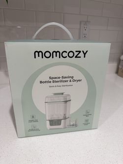 New/unopened Momcozy bottle sterilizer and dryer