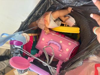 Bag of little girls toys
