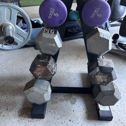Rack with weights. 5lbs, 10lbs, 15lbs and 20lbs $85