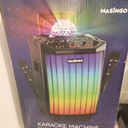 Speaker with lights , two mics, portable charger . Great for karaoke nights !