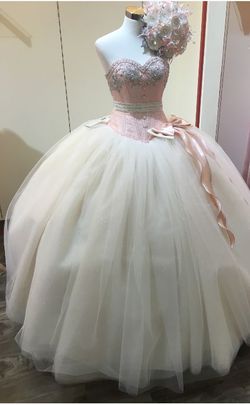 Quinceañera Dress with bouquet and tier petticoat