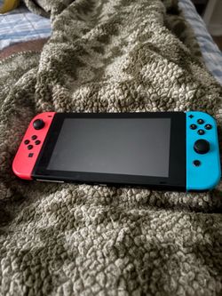 Nintendo Switch with Neon Red and Blue Joy-Cons