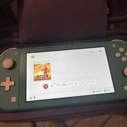 Nintendo Switch Lite With 2 Games 