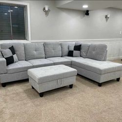 Brand New Grey Sectional With Storage Ottoman 