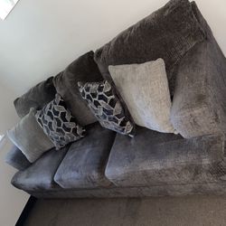 Greyish Couch And Love Seat 