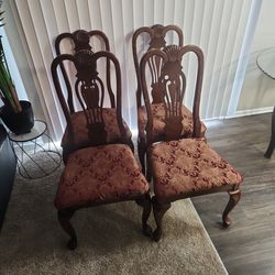 Four pristine chairs