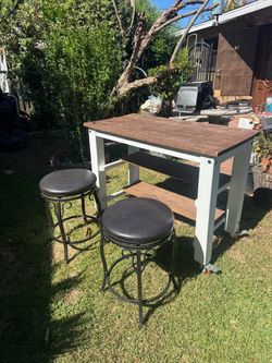 Table with bar stools