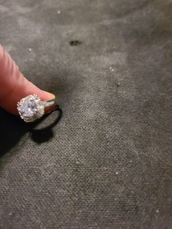 Size 6 silver ring with cubic zirconia stone. .