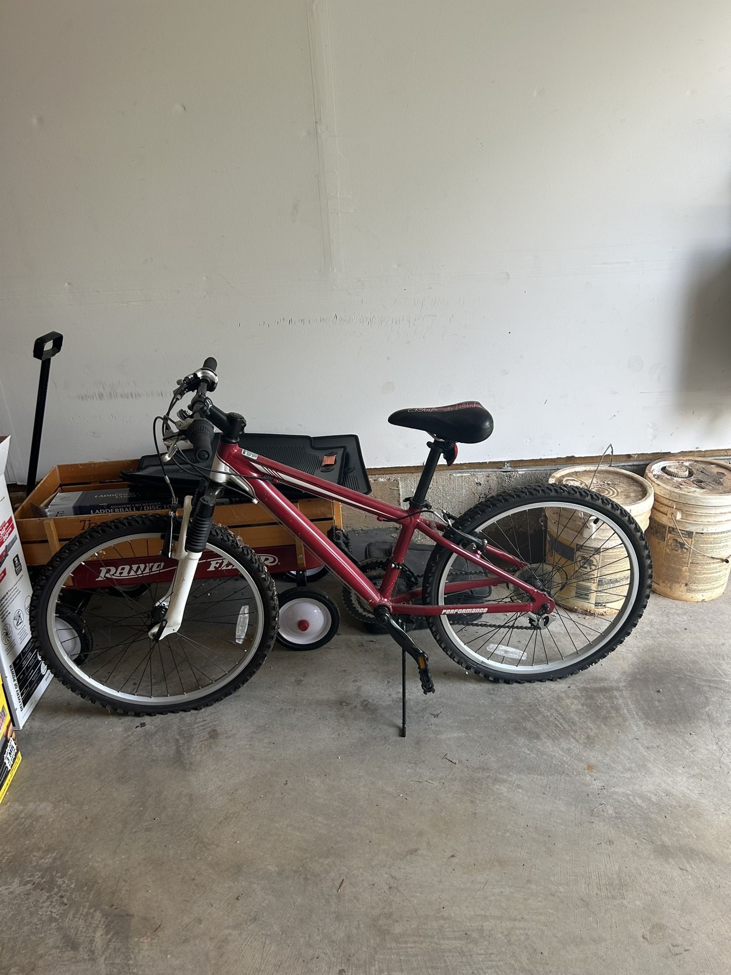 Performance 24” Kids Mountain Bike, 21 Speed, Revoshift, NEEDS NEW INNERTUBE