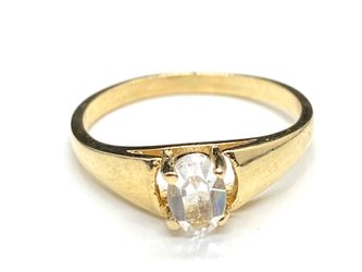 10k solid yellow gold zirconia solitaire engagement ring .