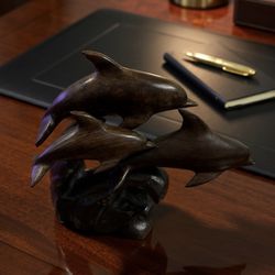 Small wooden Dolphin statue