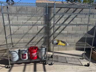 2 heavy duty metal rolling shelves
