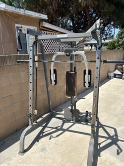 Smith machine and heavy duty bench