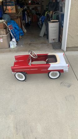 Retro Chevy metal pedal car in nice shape