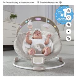 Ingenuity InLighten Twinkle Tails Vibrating Baby Bouncer With Toy Bar And Pillow