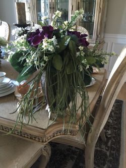 Silk flowers arrangement with bronze vase