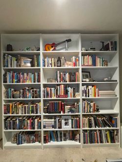 Three White IKEA Billy Bookcases with Extended Shelf