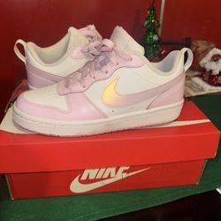 The Black And White Pandas In The All White Nikes Are Size 5Y The Pink And White Nikes Are Size 4.5 Y