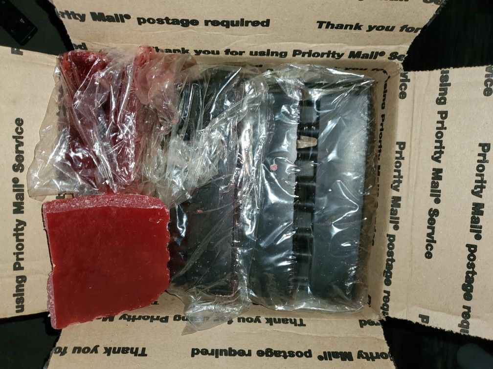 Scented blocks of wax (black and a few red)