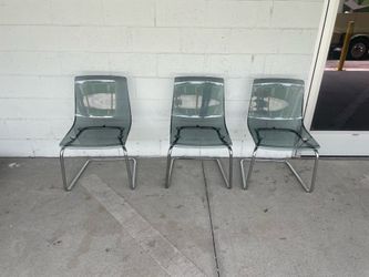 3 acrylic chairs