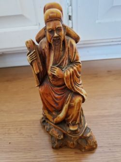 Chinese figurine. Composite material. 9" tall