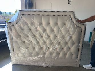 Beautiful cream colored queen size headboard