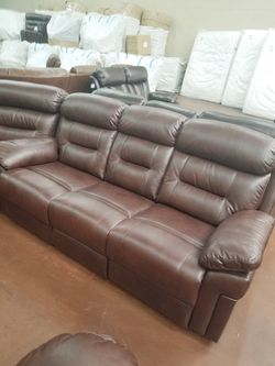 Burgandy leather recliner couch or loveseat with console