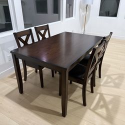 Brand new Dining table and 4 chairs