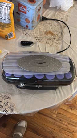 Hair roller machine