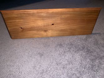 Brown Shelves With Bronze Brackets