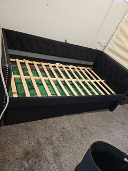 Twin size bed with pull out bed